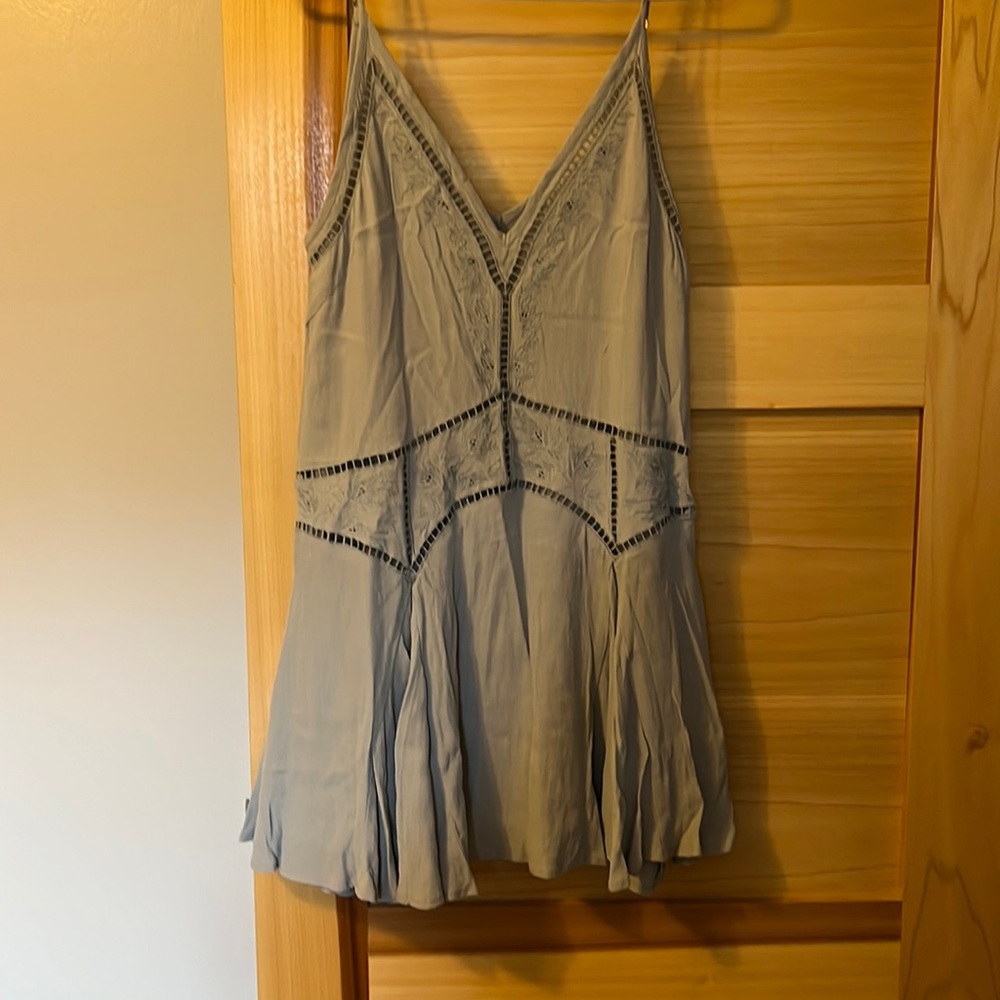 Dress 30 inches long 17 inches wide, you can adjust straps.